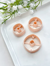 Load image into Gallery viewer, Rounded Rhombus Donut with Drill Guides Polymer Clay Cutter