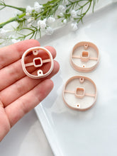 Load image into Gallery viewer, Rounded Square Donut with Drill Guides Polymer Clay Cutter
