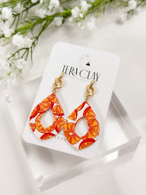 Load image into Gallery viewer, The Orange Knot Pointy Donut Earrings (also in silver)
