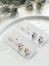 Load image into Gallery viewer, The Bow Huggie Hoops (also in silver)
