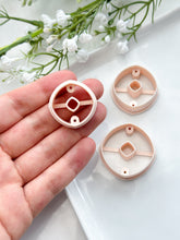 Load image into Gallery viewer, Rounded Rhombus Donut with Drill Guides Polymer Clay Cutter