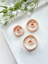 Load image into Gallery viewer, Rounded Rhombus Donut with Drill Guides Polymer Clay Cutter
