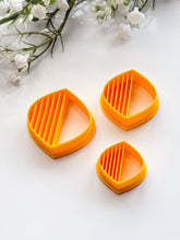 Load image into Gallery viewer, Rounded Rhombus Half Lined Polymer Clay Cutter
