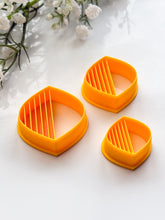 Load image into Gallery viewer, Rounded Rhombus Half Lined Polymer Clay Cutter