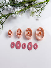Load image into Gallery viewer, Oval Donut with Drill Guides Polymer Clay Cutter PCC1855