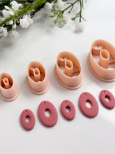 Load image into Gallery viewer, Oval Donut with Drill Guides Polymer Clay Cutter PCC1855