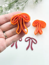 Load image into Gallery viewer, Skinny Ribbon Bow Polymer Clay Cutter