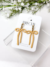 Load image into Gallery viewer, The Skinny Bow Dangles (also in silver)