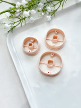 Load image into Gallery viewer, Rounded Square Donut with Drill Guides Polymer Clay Cutter
