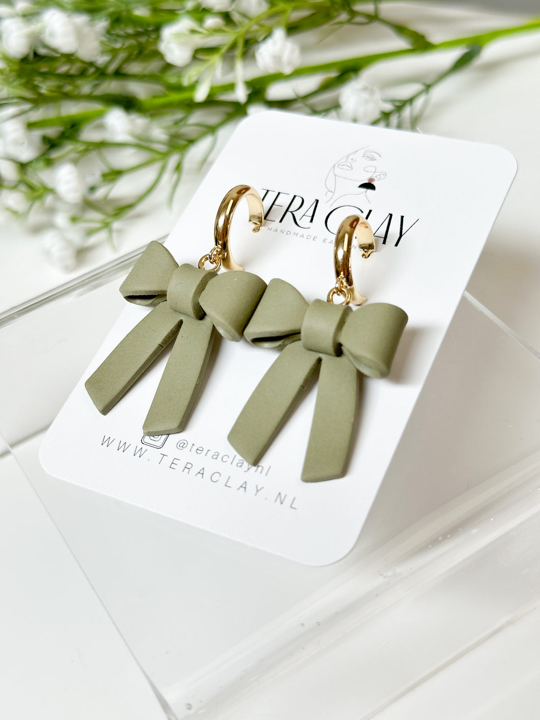 The Bow Dangles in Sage Green