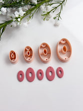 Load image into Gallery viewer, Oval Donut with Drill Guides Polymer Clay Cutter PCC1855
