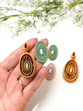 Load image into Gallery viewer, Embedded Corduroy Oval Polymer Clay Cutter
