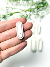 Load image into Gallery viewer, Long Oval Embedded Polymer Clay Cutter
