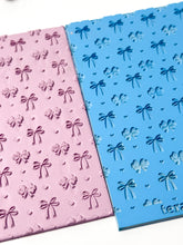 Load image into Gallery viewer, Bow Confetti Rubber Texture Mat for Polymer Clay

