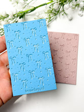 Load image into Gallery viewer, Soft Ribbon Bows Rubber Texture Mat for Polymer Clay
