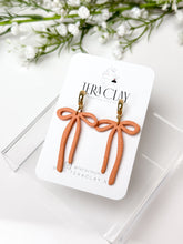 Load image into Gallery viewer, The Skinny Bow Dangles (also in silver)
