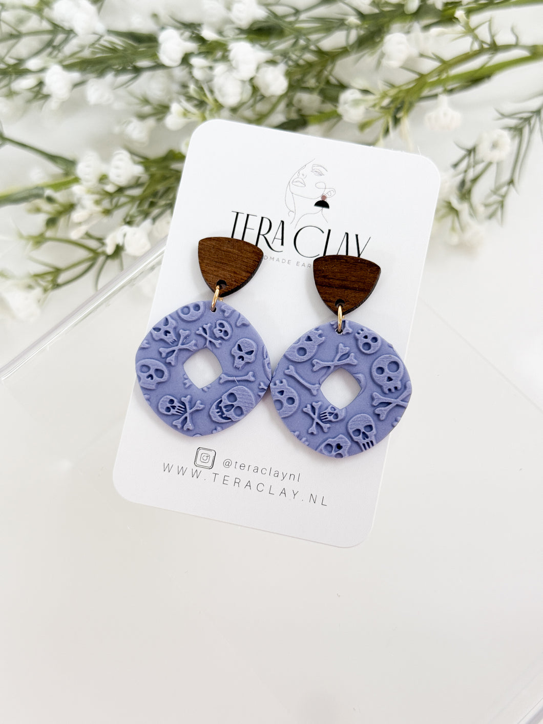 The Textured Skull Dangles (also in silver)