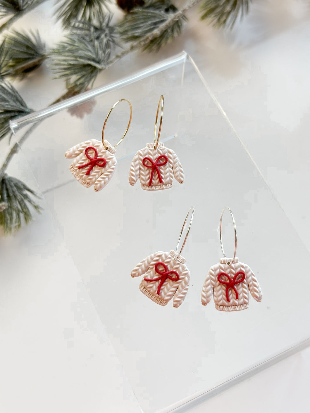 The Christmas Bow Sweater in Ivory (also in silver)