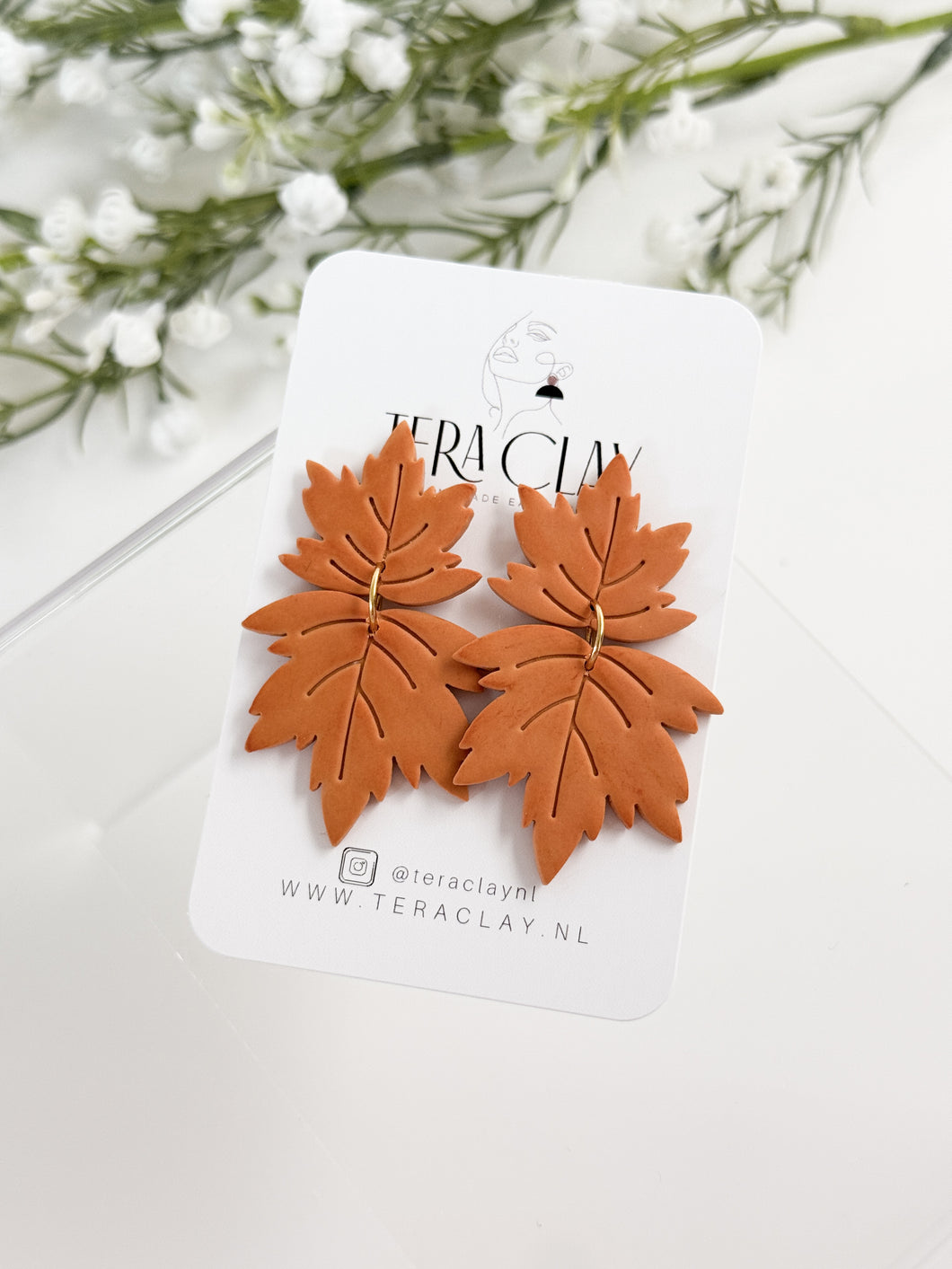The Duo Maple Leaf Dangles (also in silver)