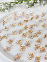 Load image into Gallery viewer, 18K Gold Plated Cubic Zirconia Flower Stud Post with Stainless Steel Ear Pins and Horizontal Loop

